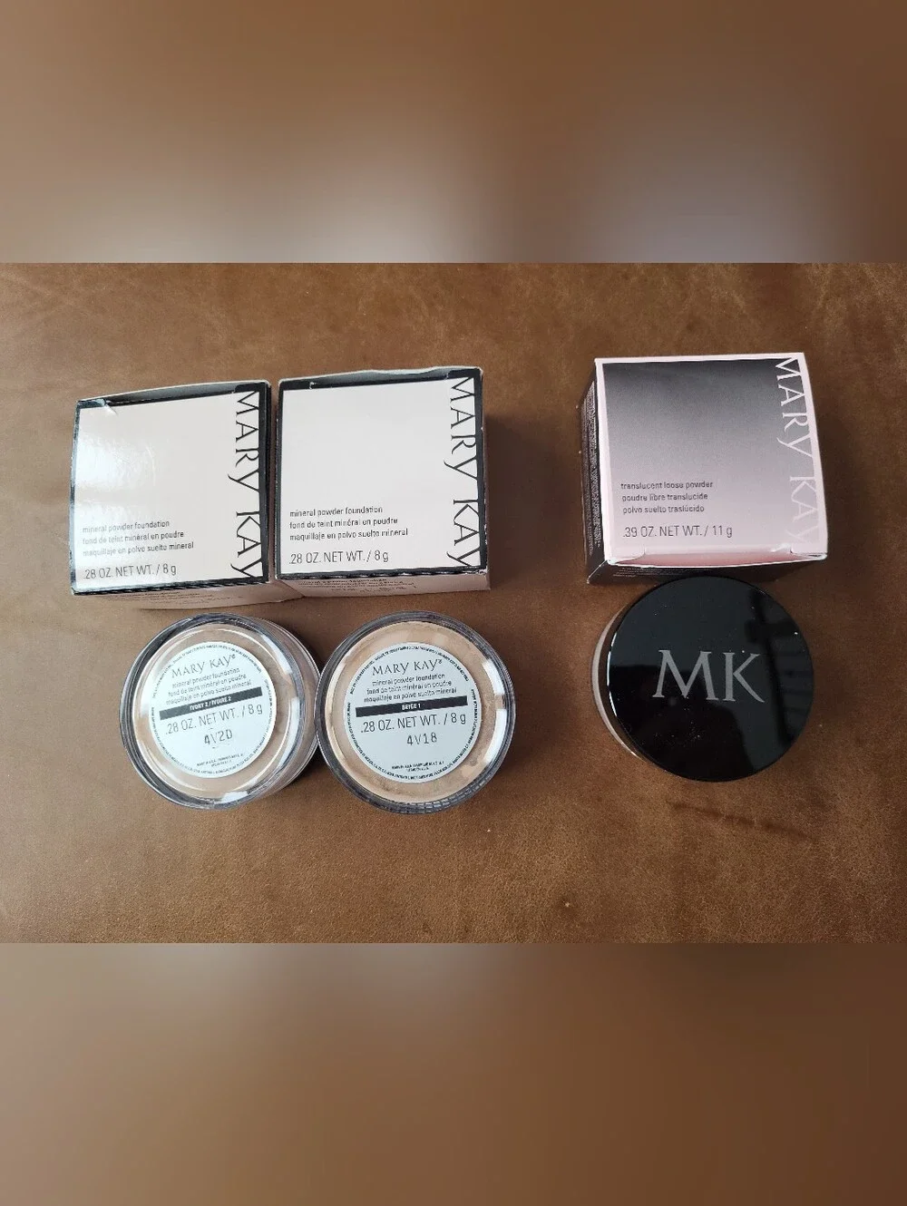 3) Mary Kay Products. 2) Mineral Powder Foundation, 1) Transculent Loose Powder.